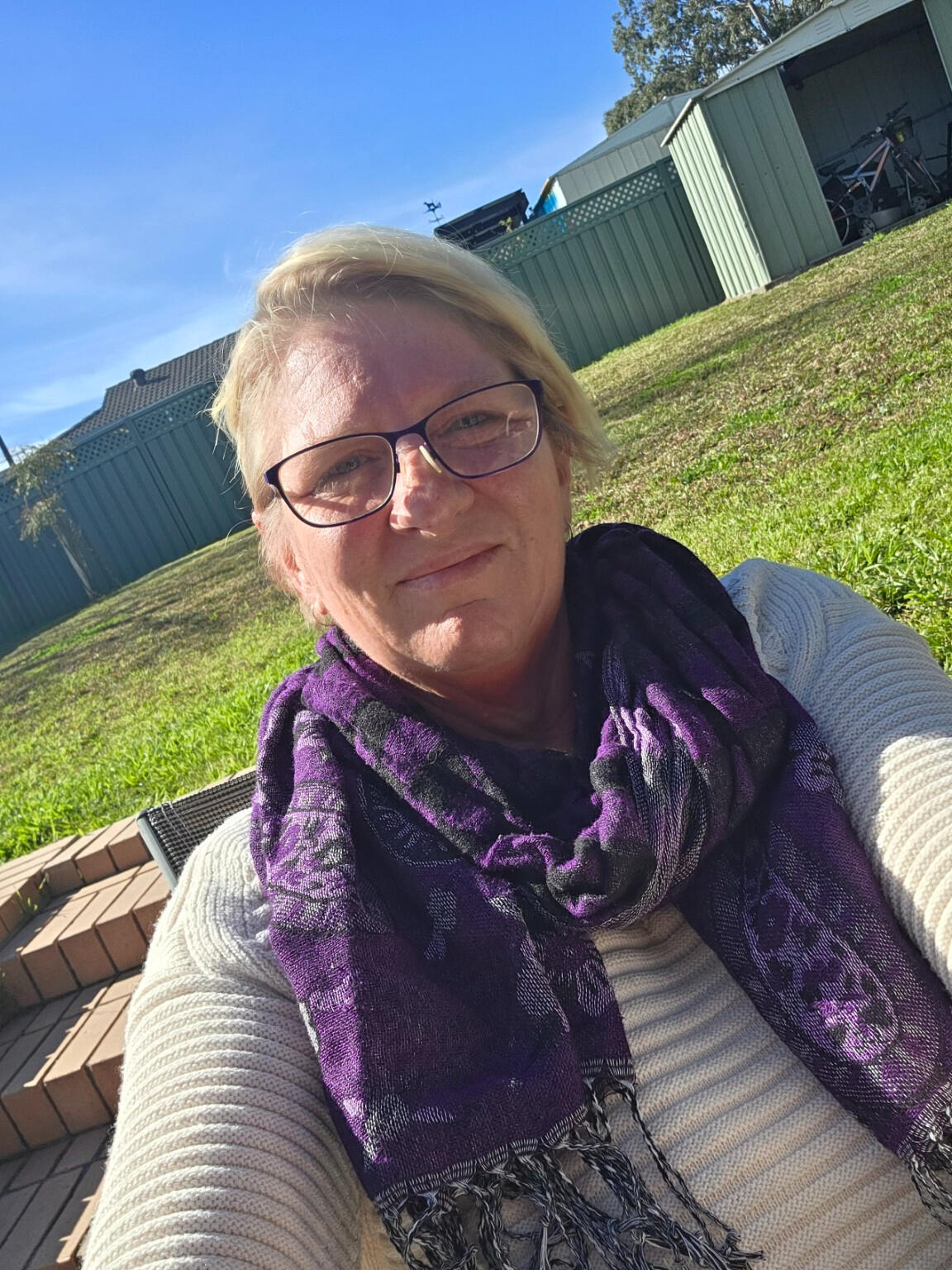 Liane today, smiling outdoors and enjoying life with renewed confidence